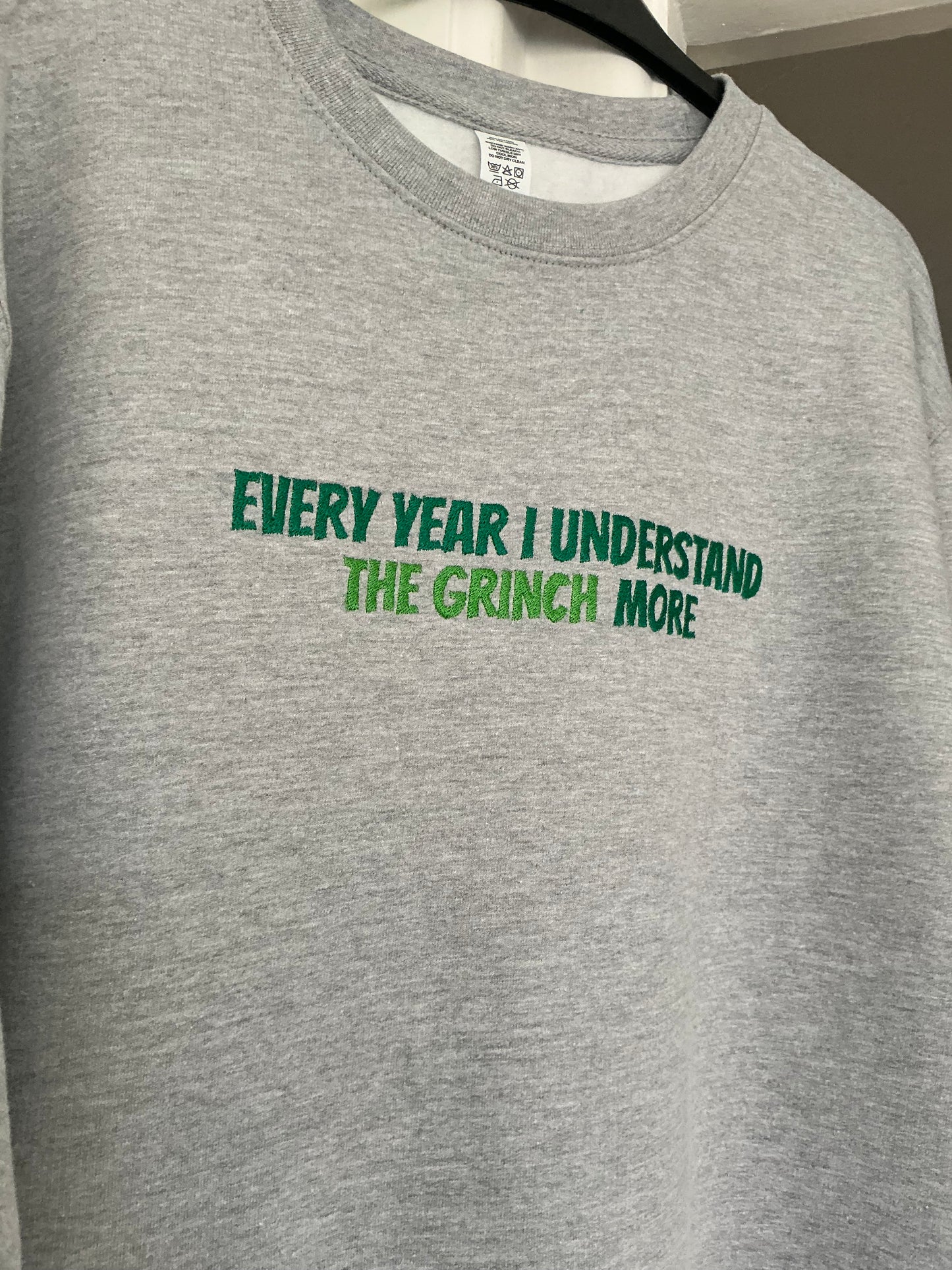 The Grinch Sweatshirt - Every year I understand the grinch more