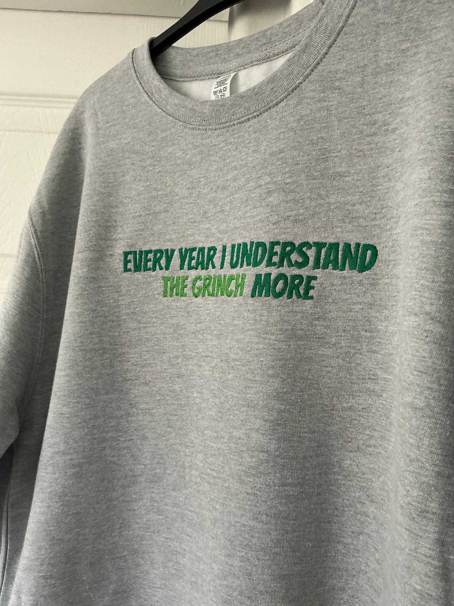 The Grinch Sweatshirt - Every year I understand the grinch more